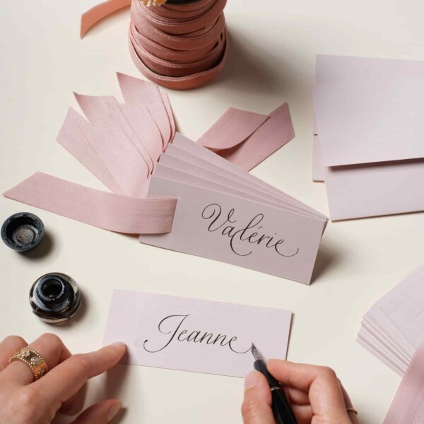 Gift tags on a working calligraphic table by Impression Originale