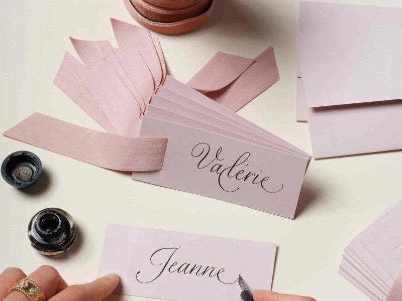 Gift tags on a working calligraphic table by Impression Originale