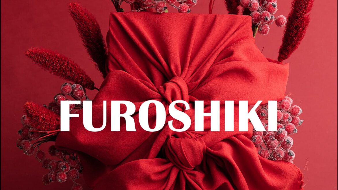 Furoshiki 8 ways to learn with tutorials from Impression Originale on a beautiful red fabric wrapping and frozen berries