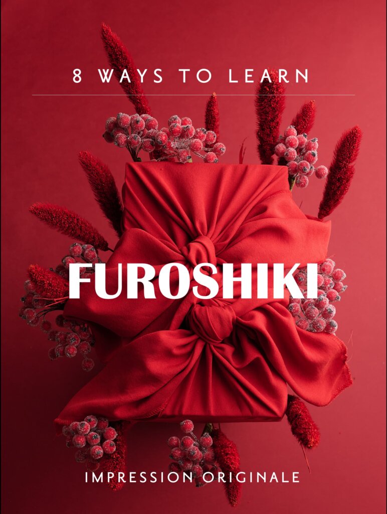 Furoshiki 8 ways to learn with tutorials from Impression Originale on a beautiful red fabric wrapping and frozen berries